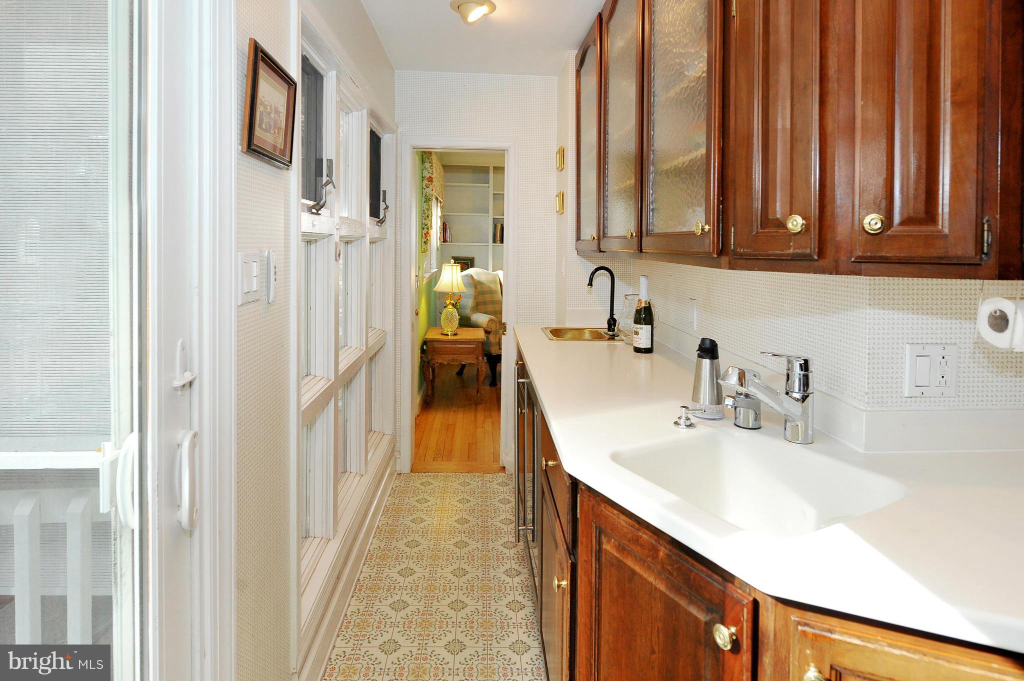 3310 Jones Bridge Road Chevy Chase, MD 20815 - Photo 6 of 21 Renovated kitchen with 2 sinks & wine fridge