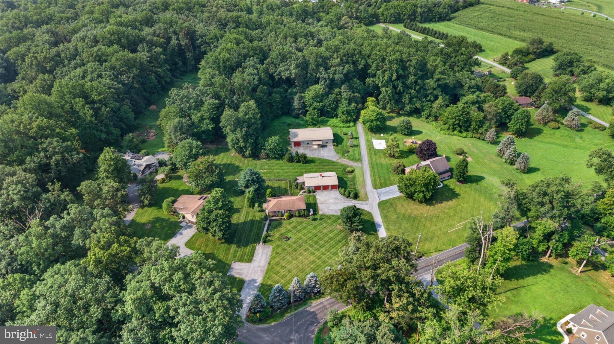 239 Lawn Road Palmyra, PA 17078 - Photo 56 of 64 Serene homes nestled in lush greenery.