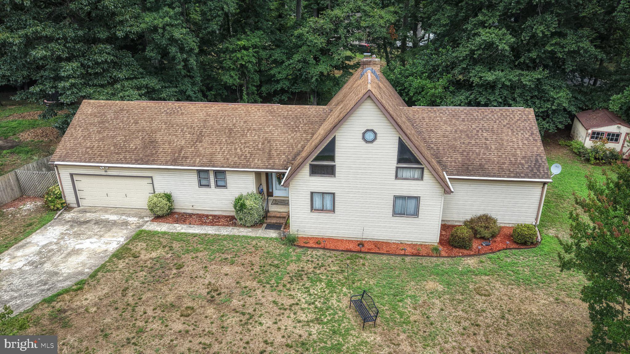 163 Pratts Branch Road Felton, DE 19943 - Photo 2 of 55 Charming home nestled in nature's embrace.