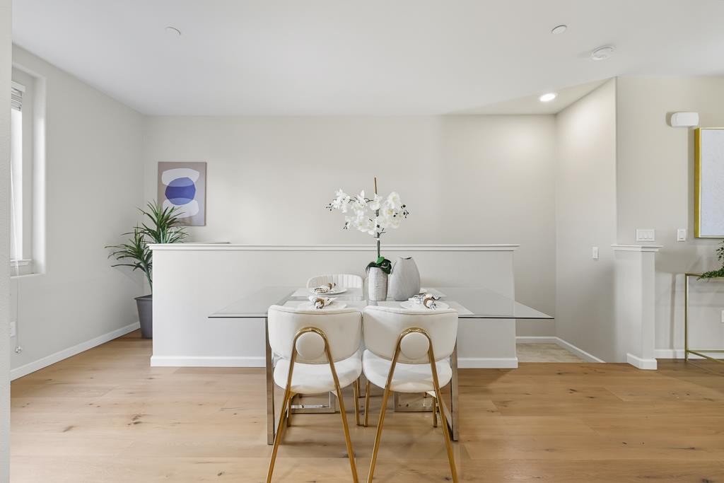 1036 Onofrio Lane, Unit 6 San Jose, CA 95133 - Photo 20 of 50 a view of a dining room with furniture