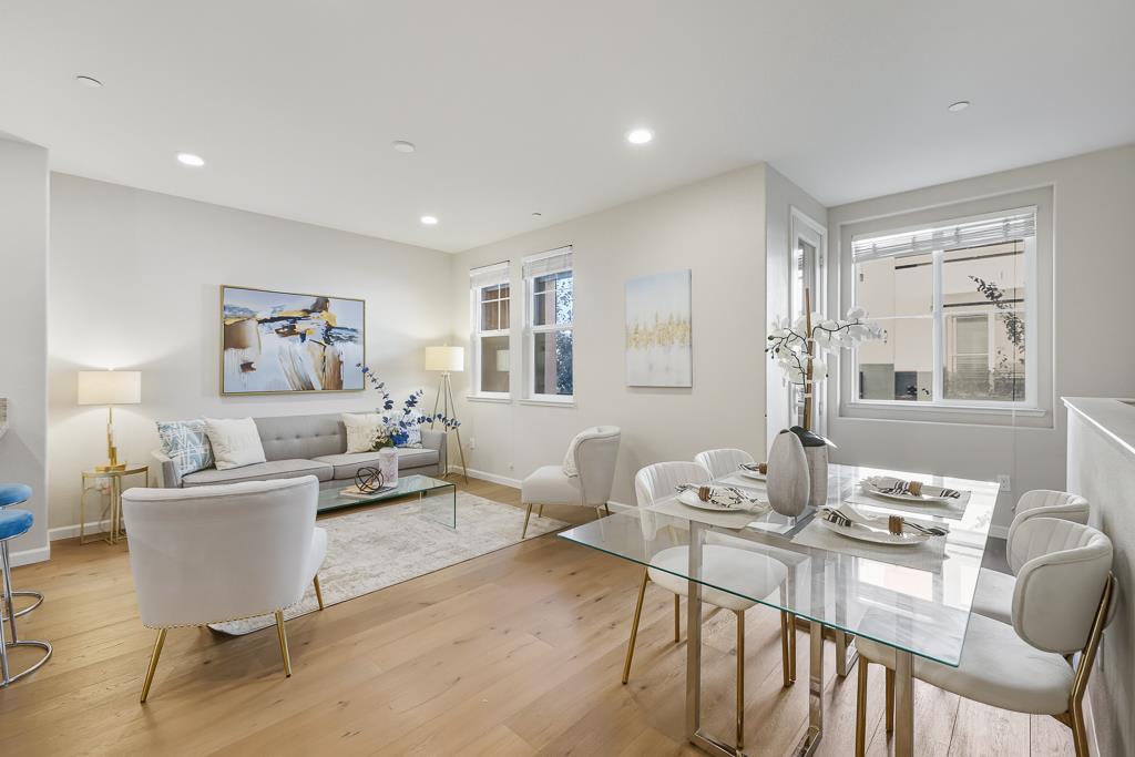 1036 Onofrio Lane, Unit 6 San Jose, CA 95133 - Photo 3 of 50 a living room with furniture and a table