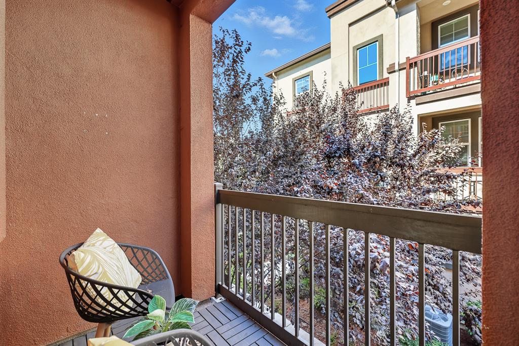 1036 Onofrio Lane, Unit 6 San Jose, CA 95133 - Photo 39 of 50 a view of a chair in wooden deck