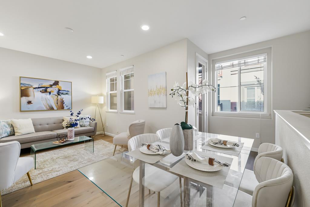 1036 Onofrio Lane, Unit 6 San Jose, CA 95133 - Photo 4 of 50 a living room with furniture and wooden floor