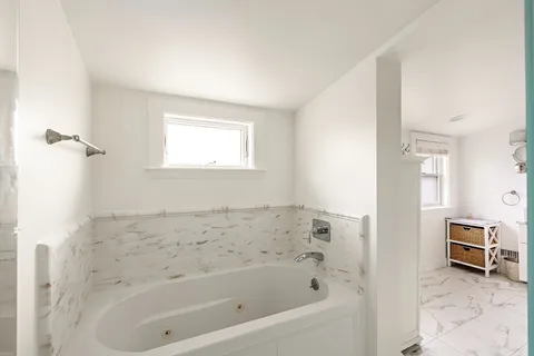 a bathroom with a bathtub