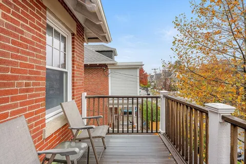 a view of a chairs on the roof deck