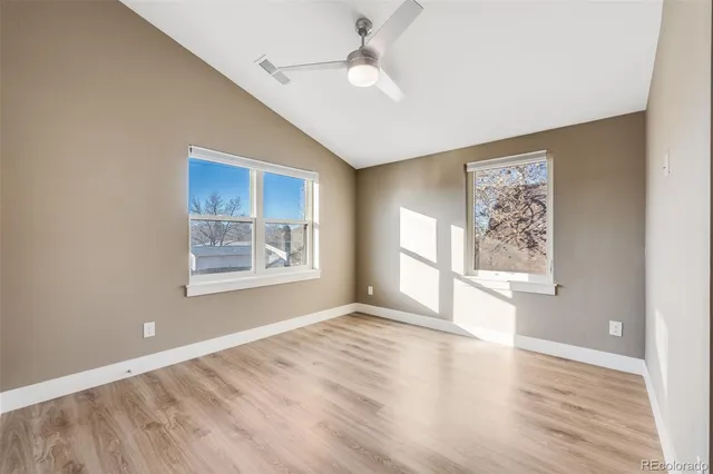 a white bath tub sitting next to a toilet