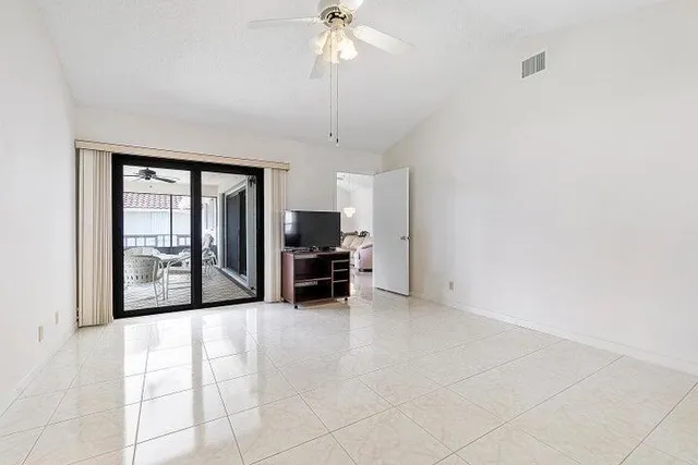a view of a livingroom with a flat screen tv