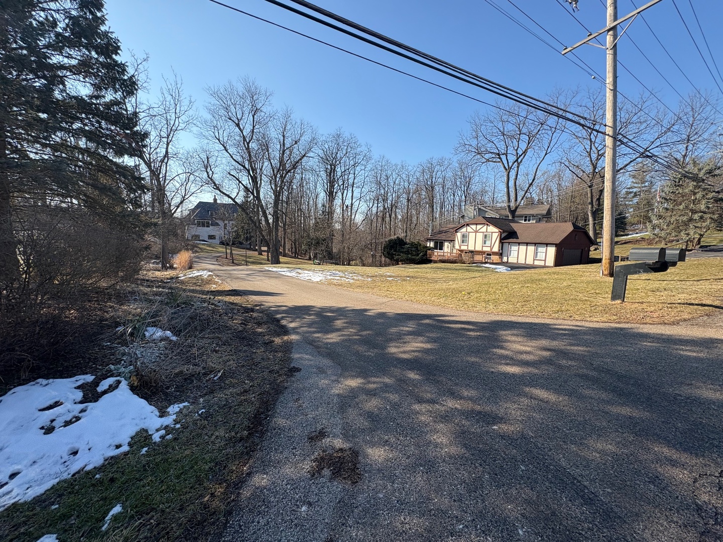 611 East Main Street Cary, IL 60013 - Photo 2 of 4 a view of a yard with wooden fence