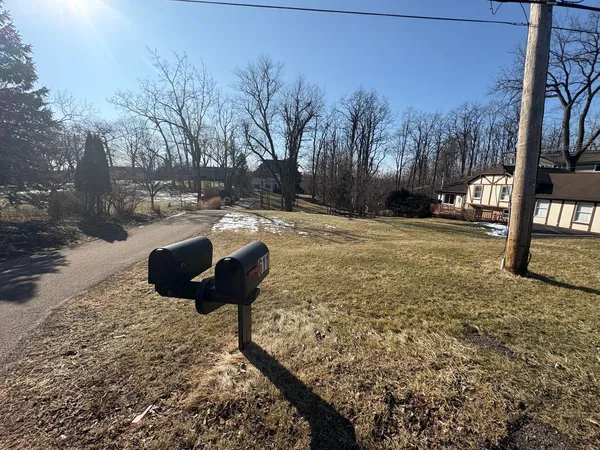 a view of a backyard of the house