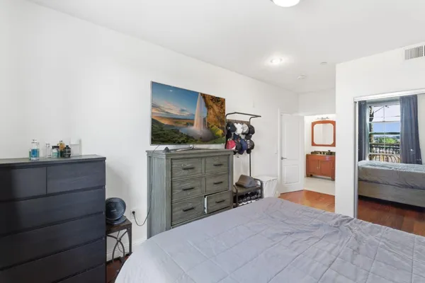 a bedroom with a bed and furniture