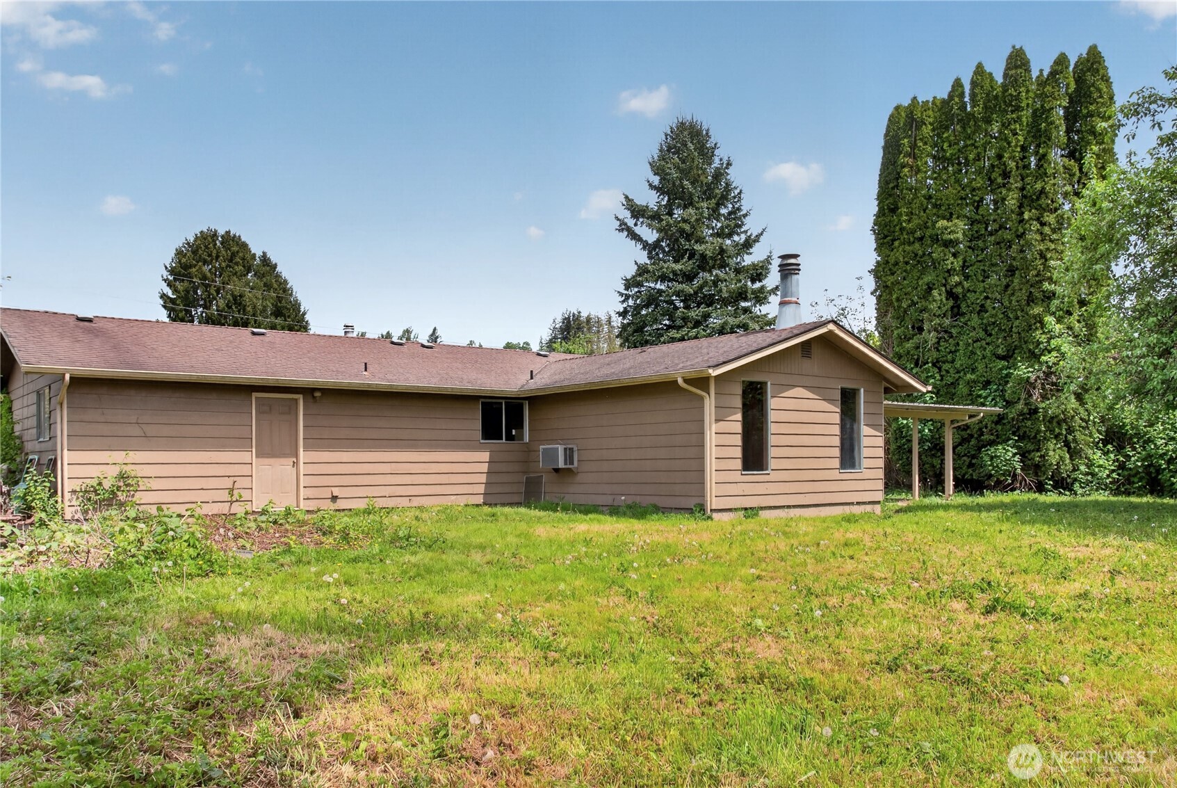 716 Murphy Way Sultan, WA 98294 - Photo 30 of 31 a house view with a garden space
