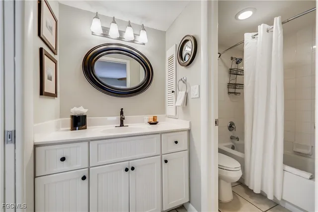a living room with a couch and a large window