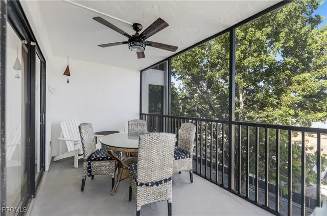 a view of a swimming pool with a sitting space
