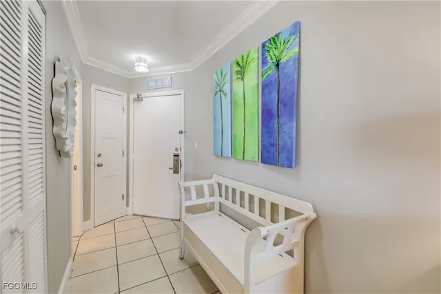 a living room with furniture a clock and a window