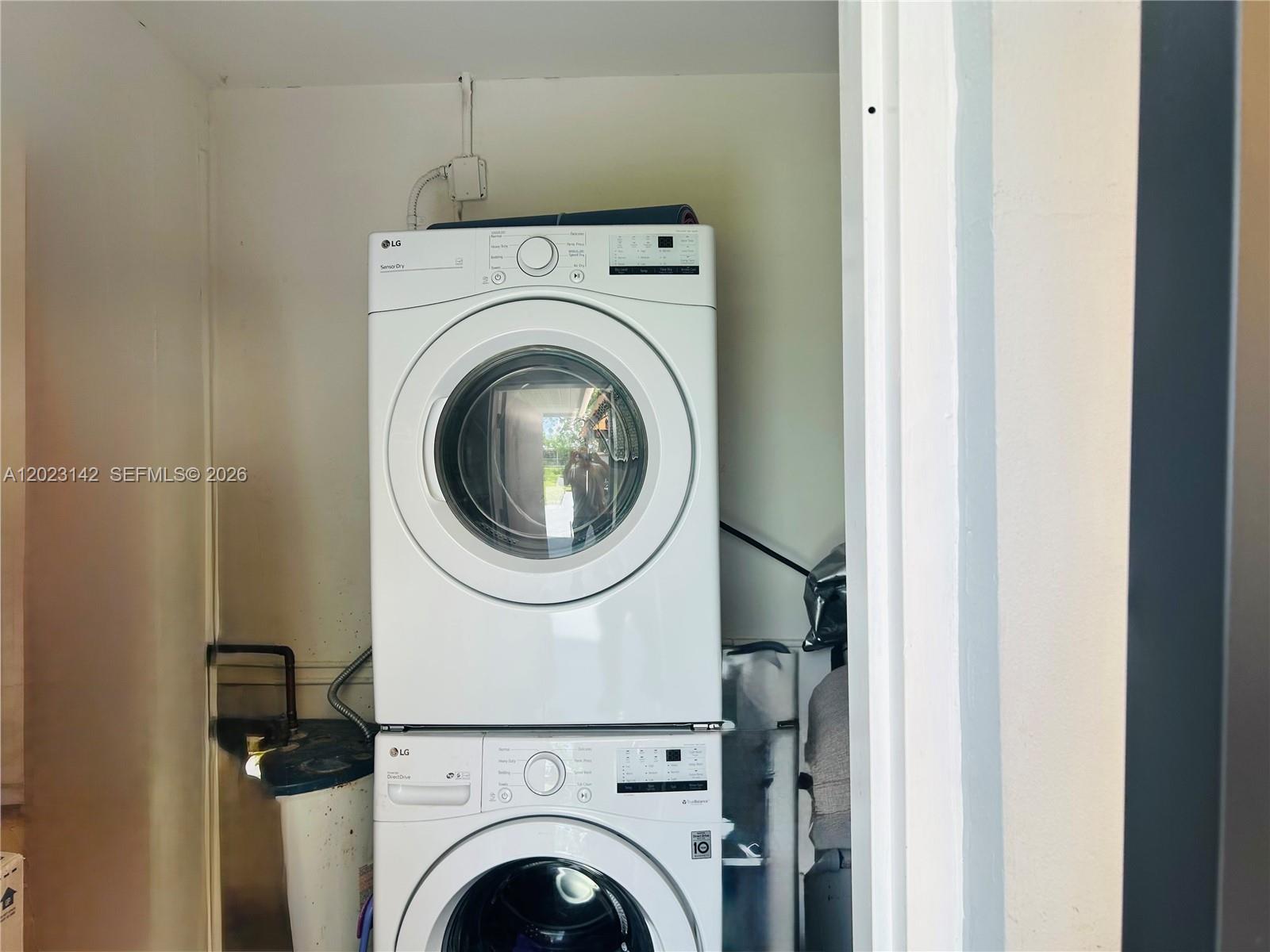 3410 Southwest 89th Court Miami, FL 33165 - Photo 16 of 18 a close up view of a washer and dryer