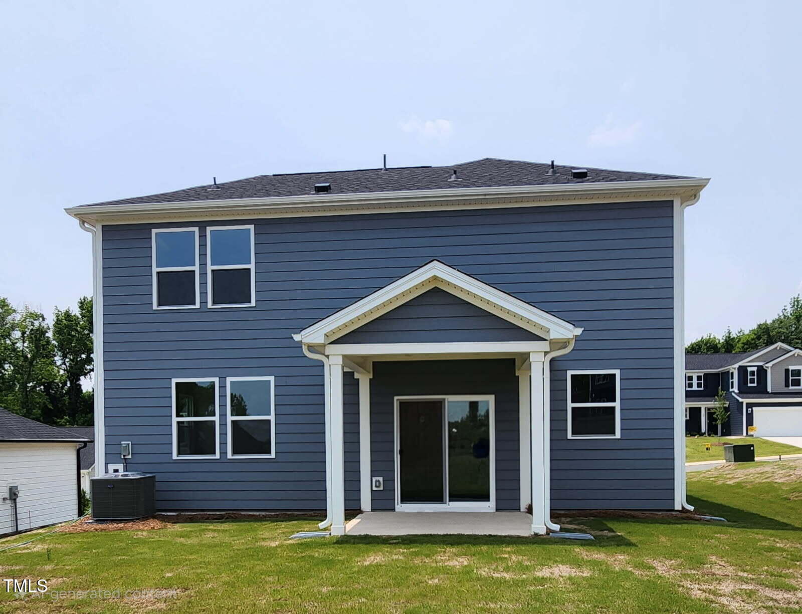 28 Longdale Drive Graham, NC 27253 - Photo 11 of 28 a view of a house with a yard potted plants and a table