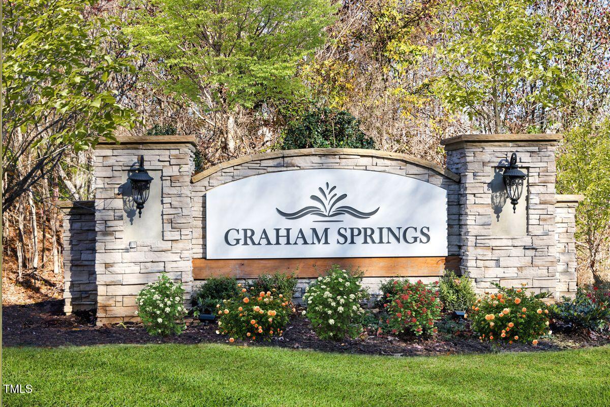 28 Longdale Drive Graham, NC 27253 - Photo 28 of 28 a sign on the side of a building