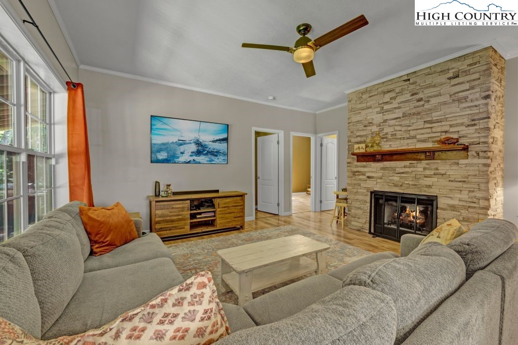 61 Snowbird Lane Linville, NC 28657 - Photo 2 of 19 a living room with furniture and a fireplace