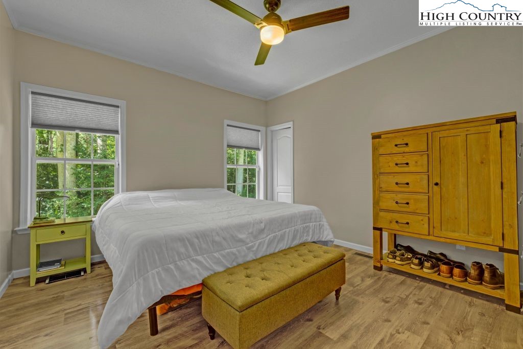 61 Snowbird Lane Linville, NC 28657 - Photo 6 of 19 a bedroom with a bed and a window