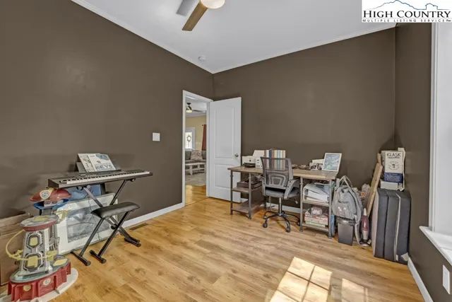 a view of a workspace with furniture