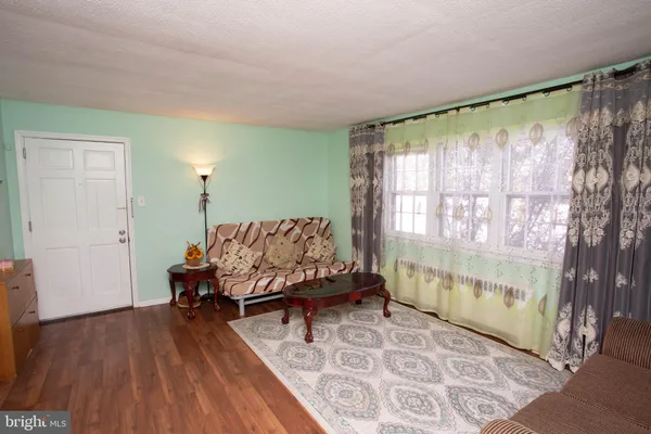 a bed room with a bed and a window