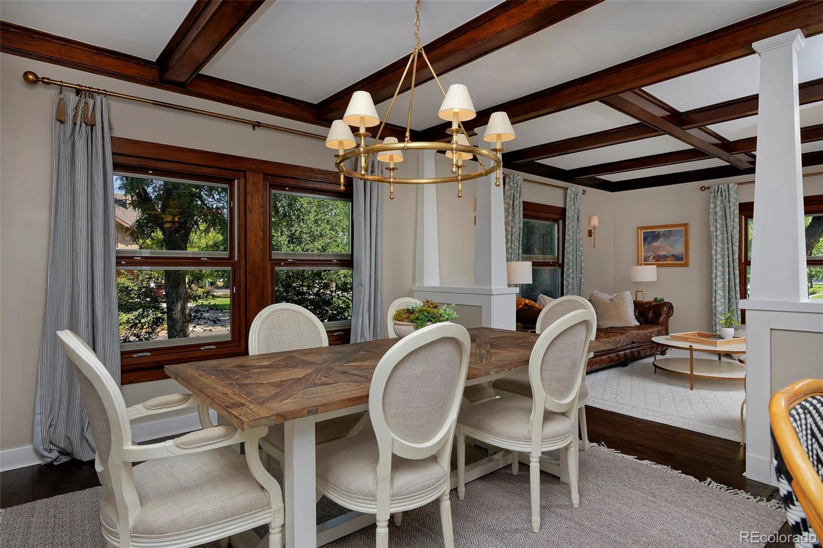 2591 Ash Street Denver, CO 80207 - Photo 12 of 48 a view of a dining room with furniture window and outside view