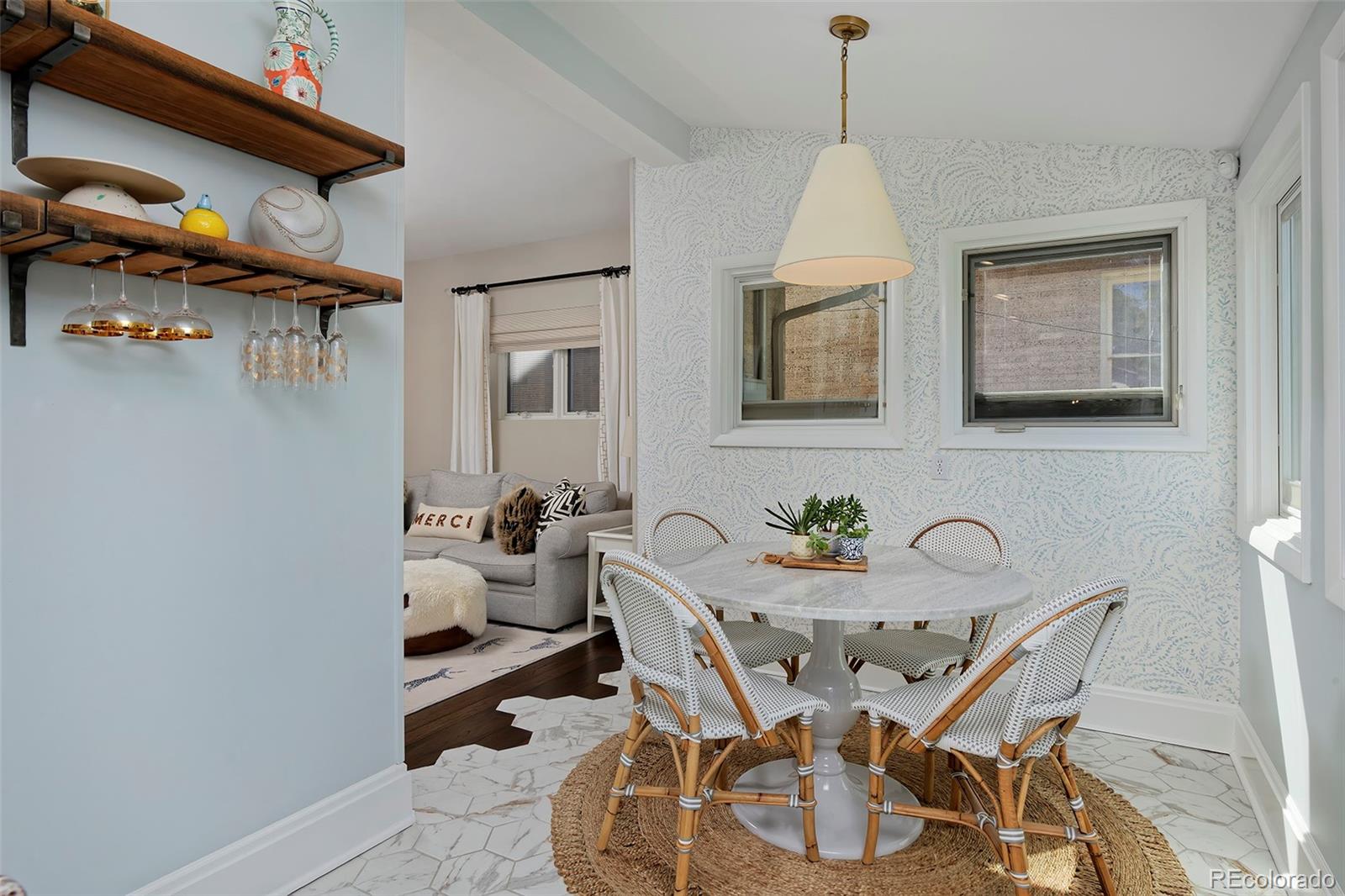 2591 Ash Street Denver, CO 80207 - Photo 18 of 48 a dining room with furniture and window