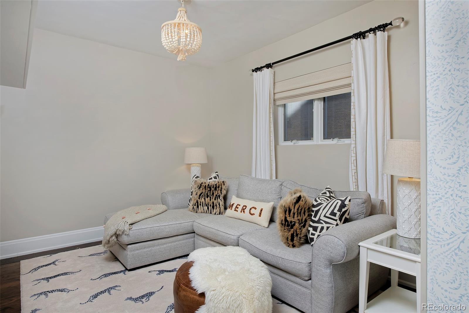 2591 Ash Street Denver, CO 80207 - Photo 20 of 48 a living room with furniture