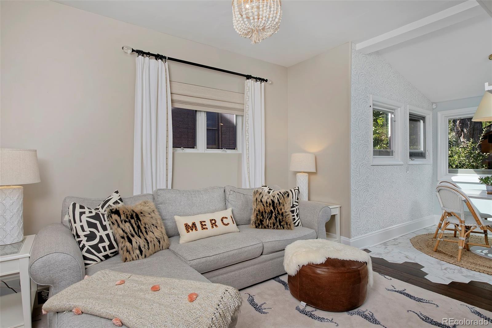 2591 Ash Street Denver, CO 80207 - Photo 22 of 48 a bedroom with furniture and a window