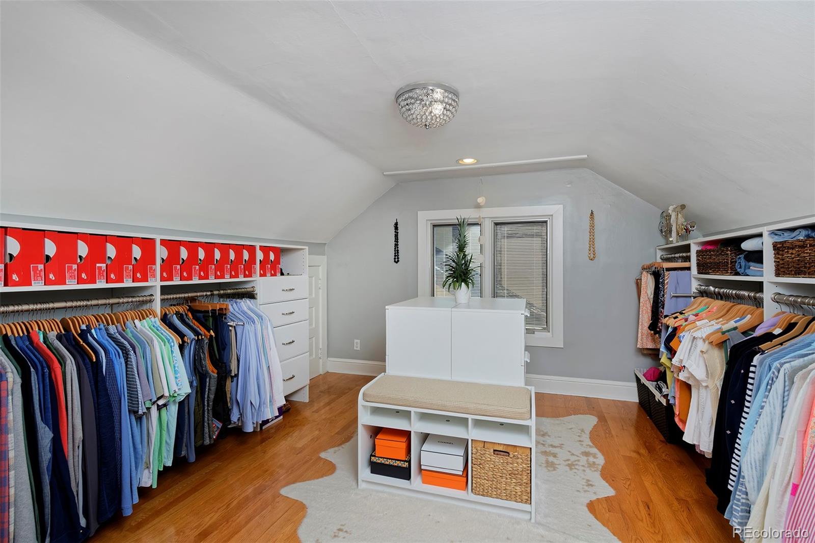 2591 Ash Street Denver, CO 80207 - Photo 28 of 48 a living room with furniture and a flat screen tv