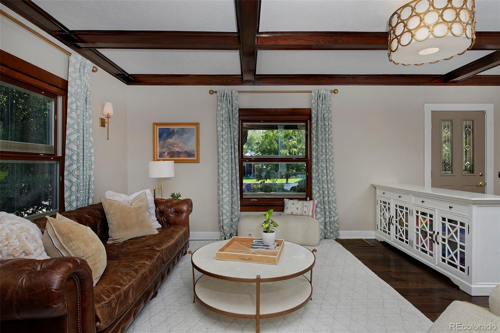 2591 Ash Street Denver, CO 80207 - Photo 10 of 48 a living room with furniture and a window