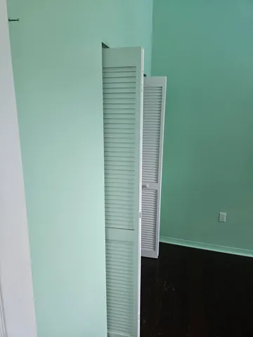 a view of a bath tub sitting in a bathroom