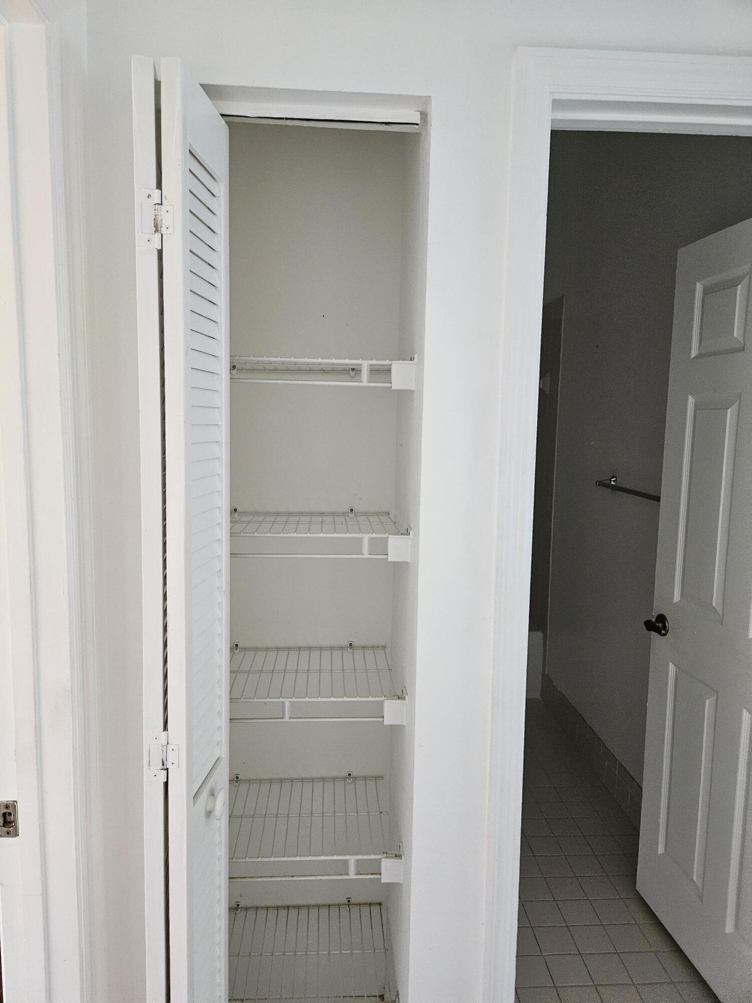 21109 Northeast 3rd Court Miami, FL 33179 - Photo 29 of 30 a view of a walk in closet