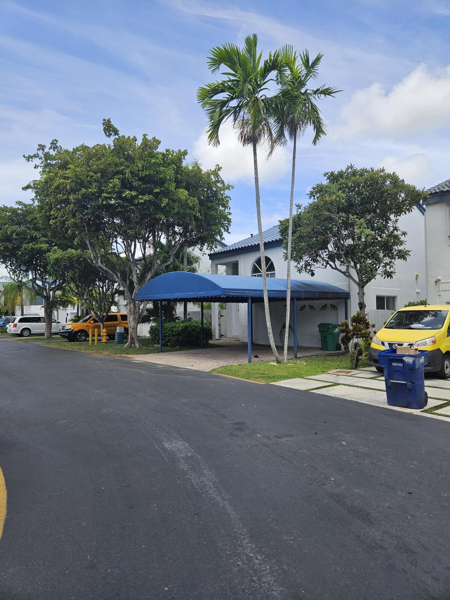 21109 Northeast 3rd Court Miami, FL 33179 - Photo 3 of 30 a view of outdoor space yard and swimming pool