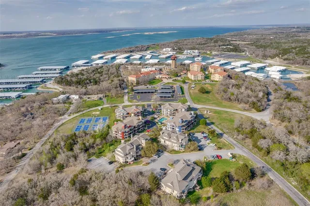 an aerial view of ocean with residential building and ocean view