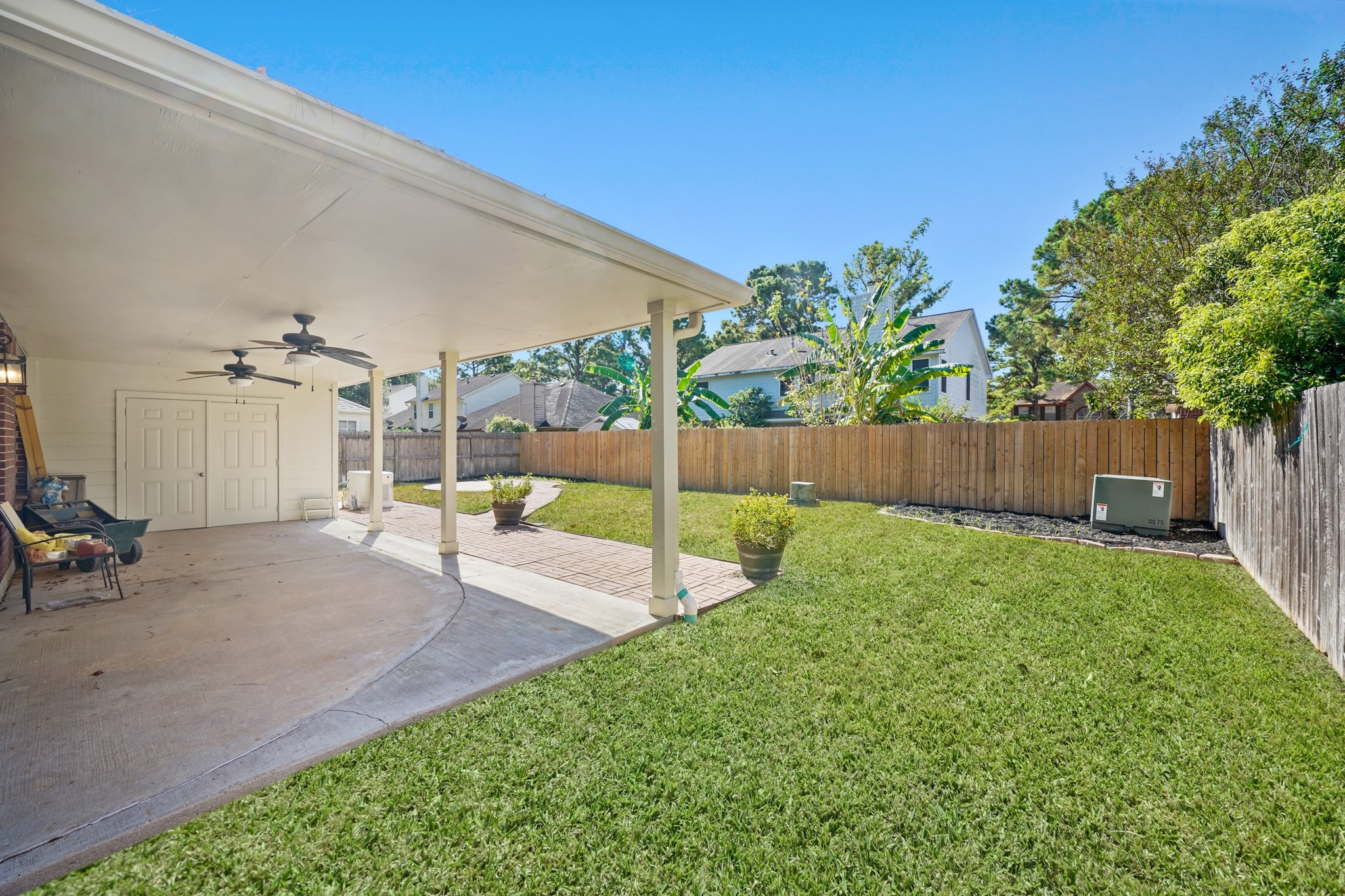 16215 Wemyss Bay Road Houston, TX 77095 - Photo 15 of 44 a view of a backyard with sitting area