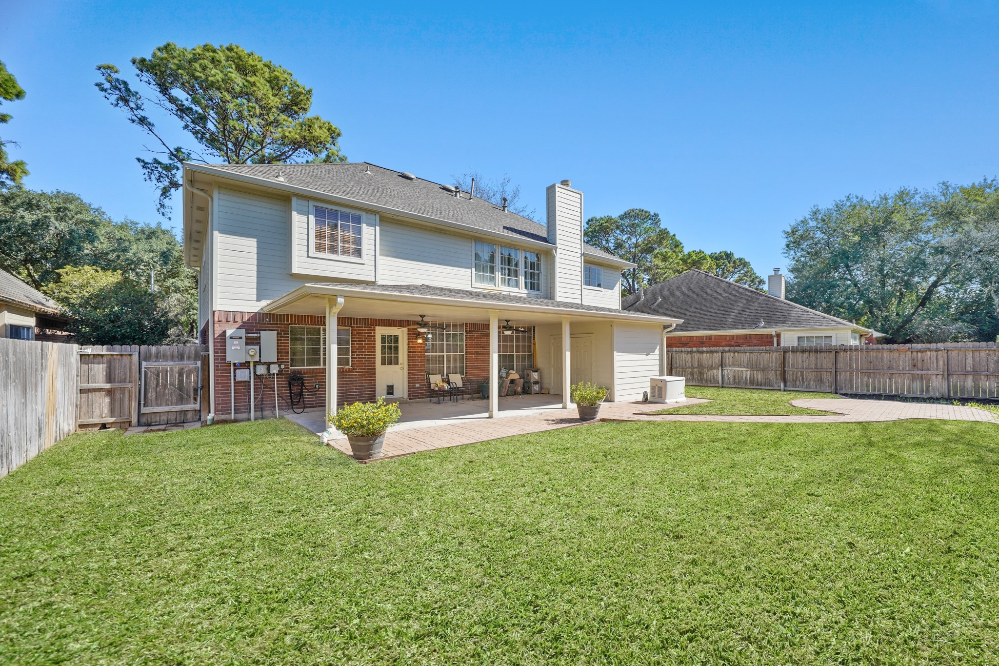 16215 Wemyss Bay Road Houston, TX 77095 - Photo 16 of 44 front view of a house with a yard