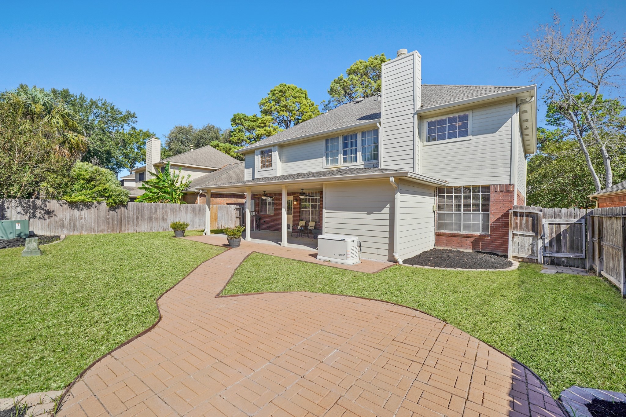 16215 Wemyss Bay Road Houston, TX 77095 - Photo 17 of 44 a front view of a house with a yard