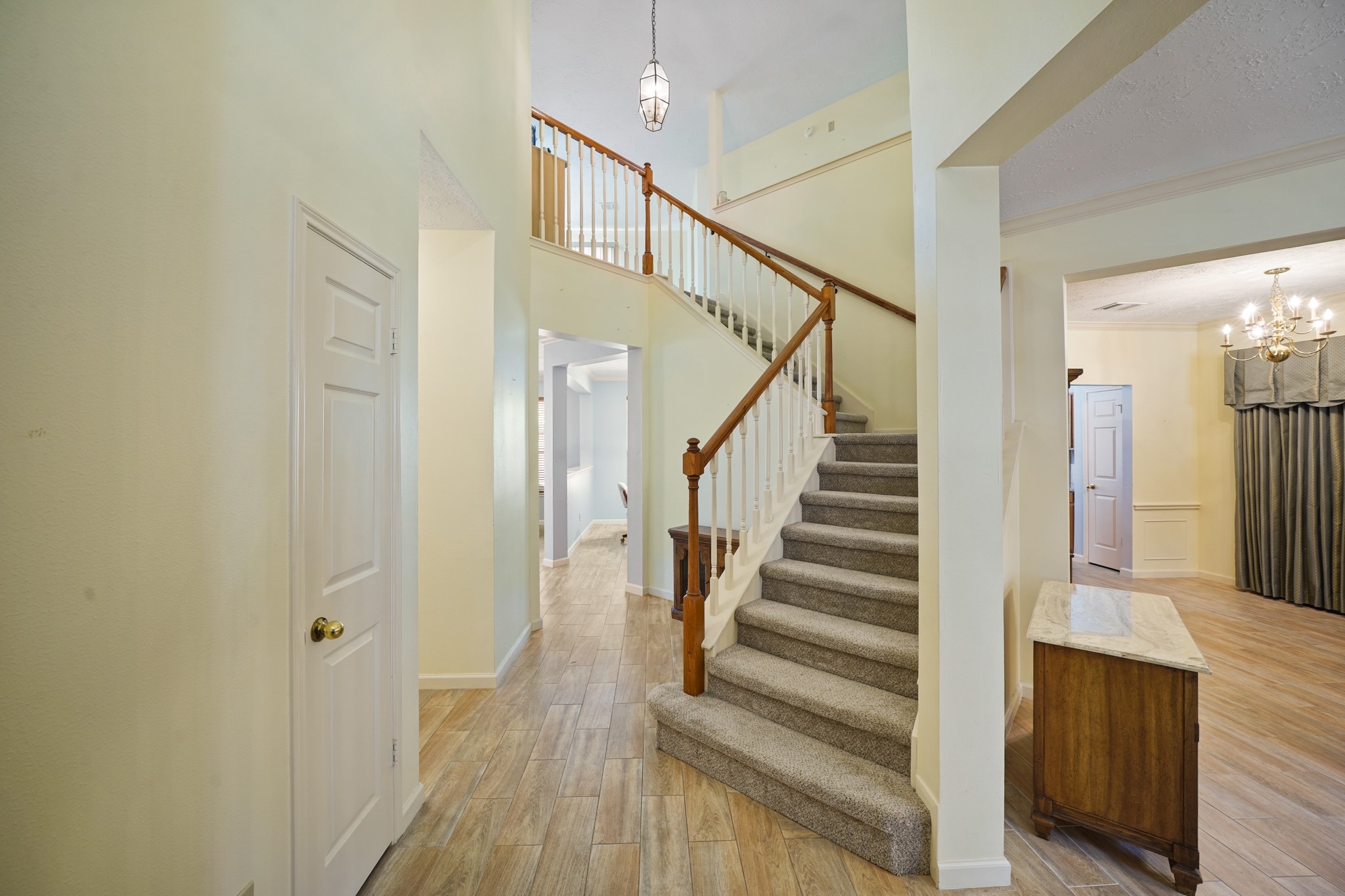 16215 Wemyss Bay Road Houston, TX 77095 - Photo 20 of 44 a view of staircase with wooden floor and staircase