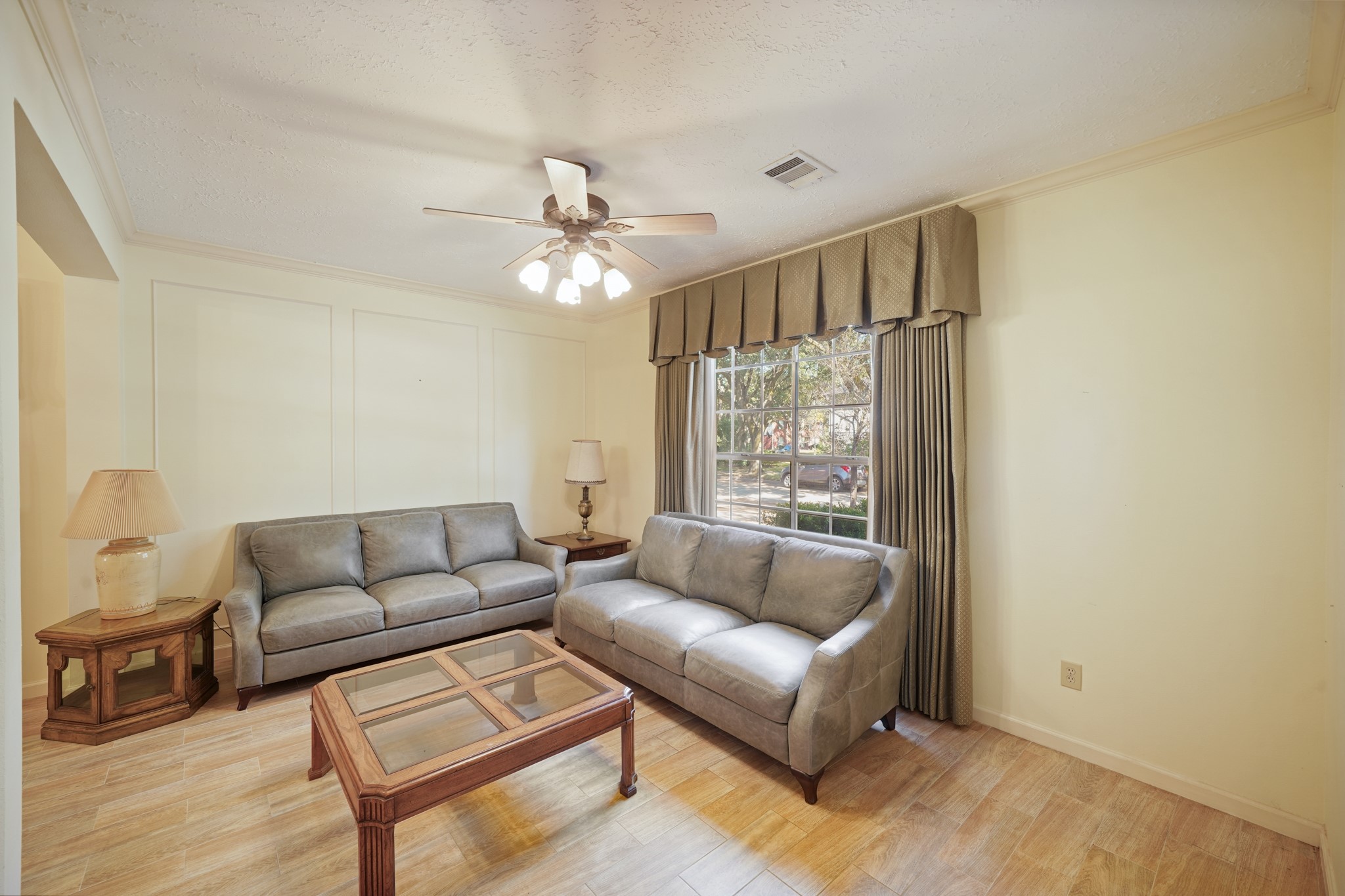 16215 Wemyss Bay Road Houston, TX 77095 - Photo 21 of 44 a living room with furniture and a large window