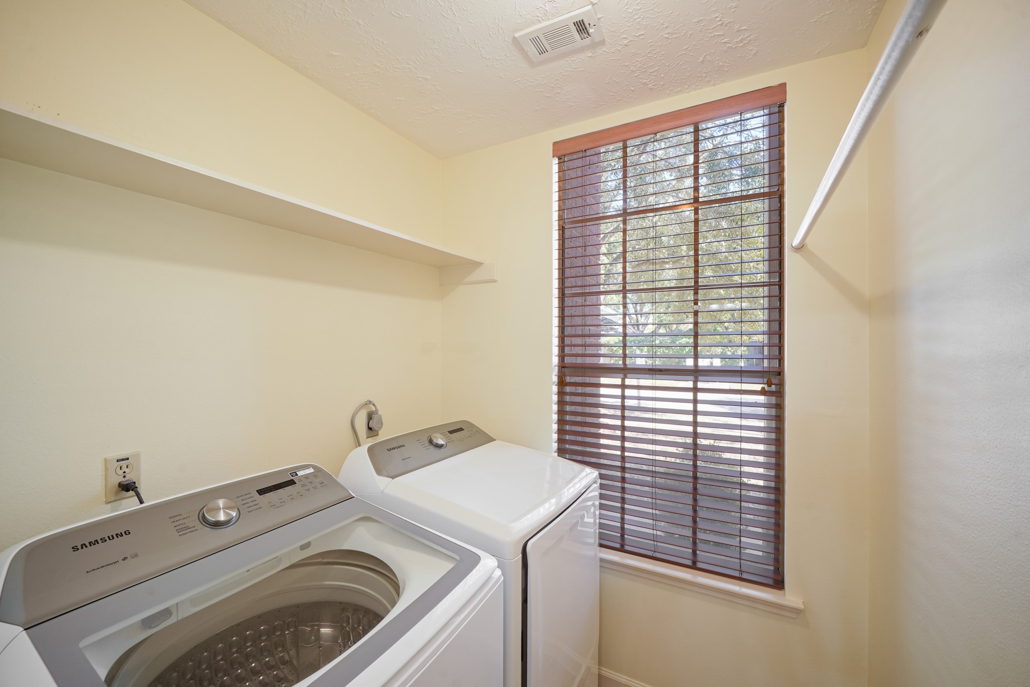 16215 Wemyss Bay Road Houston, TX 77095 - Photo 27 of 44 a utility room with dryer and washer