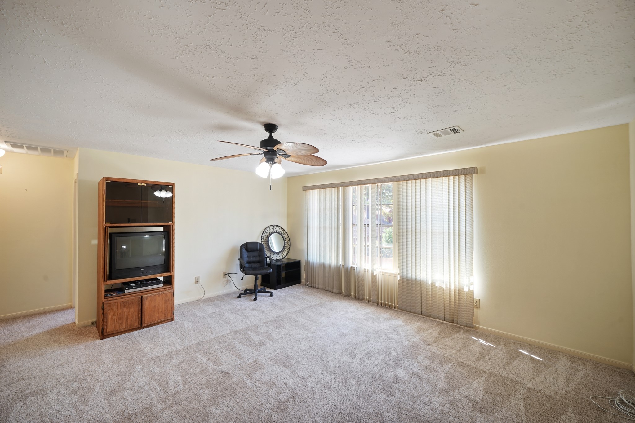 16215 Wemyss Bay Road Houston, TX 77095 - Photo 28 of 44 a living room with furniture and a window