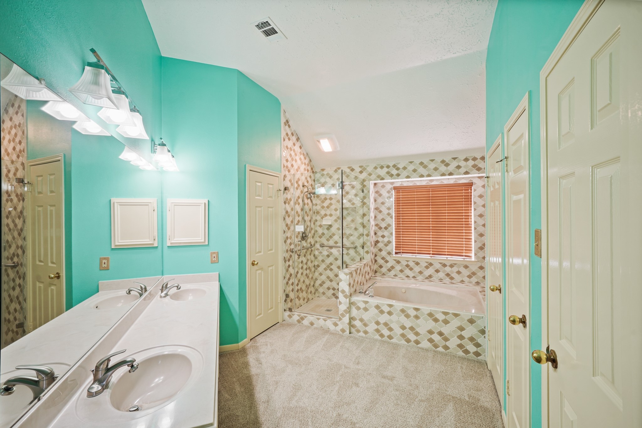 16215 Wemyss Bay Road Houston, TX 77095 - Photo 41 of 44 a bathroom with a tub sink and mirror