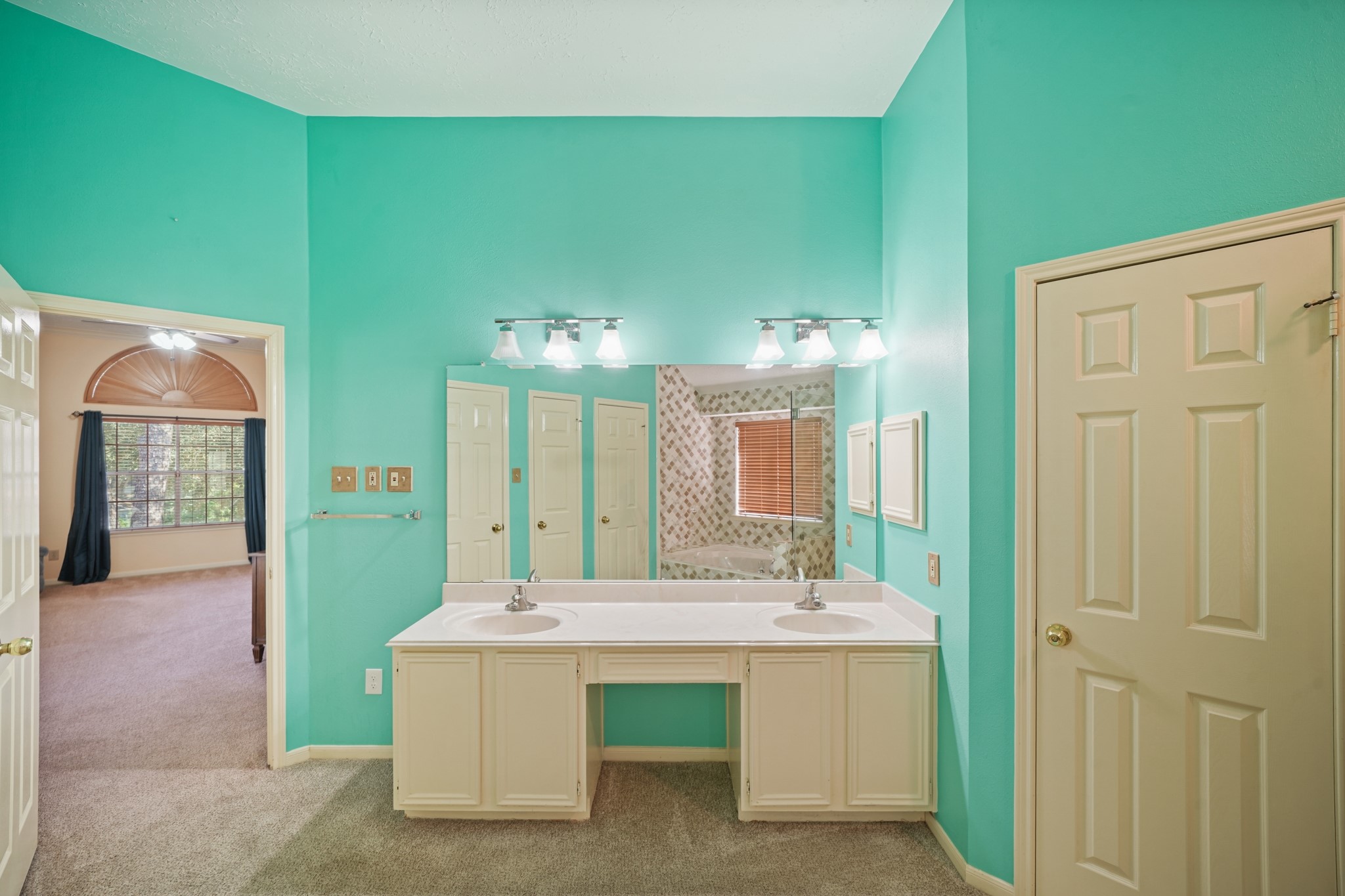 16215 Wemyss Bay Road Houston, TX 77095 - Photo 42 of 44 a bathroom with a sink and mirror