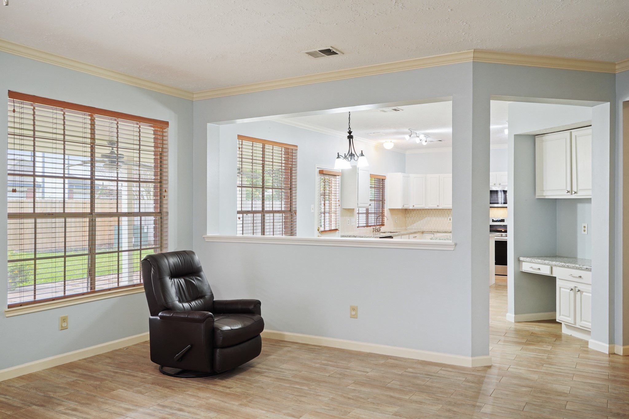 16215 Wemyss Bay Road Houston, TX 77095 - Photo 8 of 44 a living room with furniture and a large window