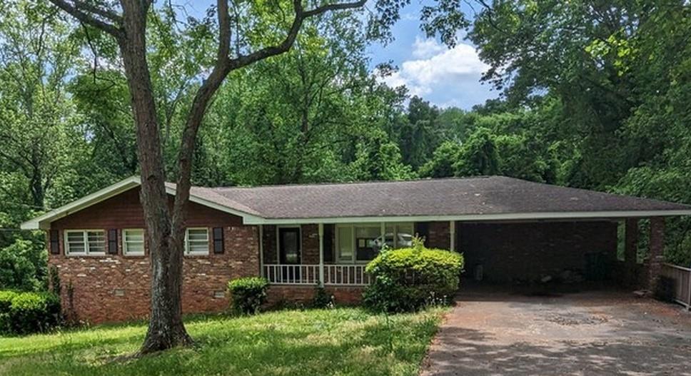 4441 Mark Anthony Court Decatur, GA 30035 - Photo 1 of 1 front view of a house with a yard