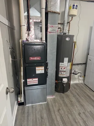 a room with furniture and wooden floor