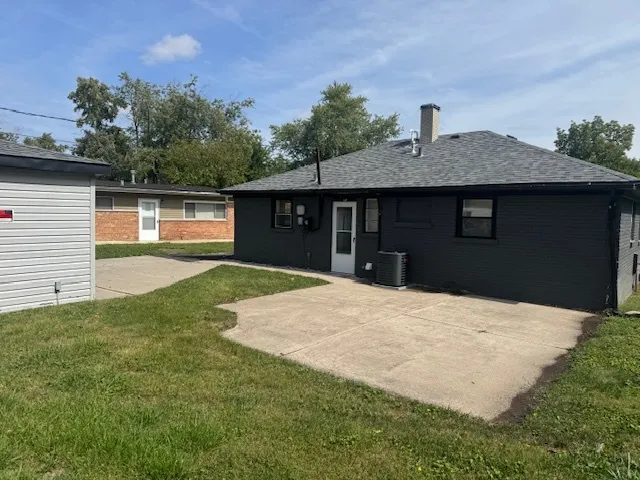 a house view with a garden space
