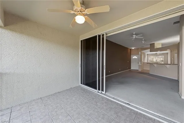 $245,000 | 23810 Costa Del Sol Road, Unit 203, Estero, FL 34135