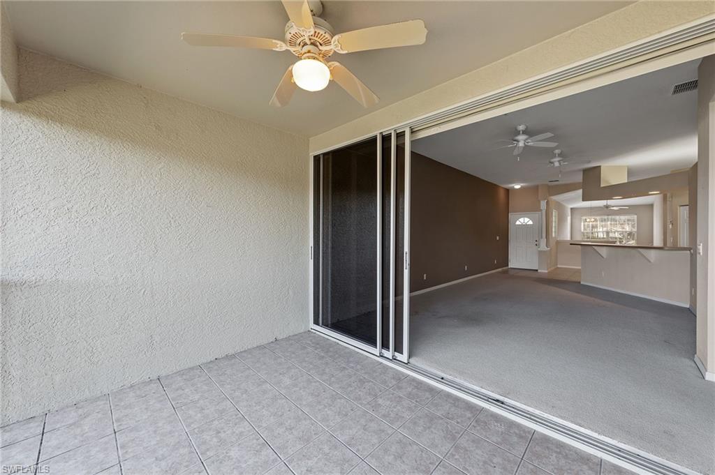 23810 Costa Del Sol Road, Unit 203 Estero, FL 34135 - Photo 28 of 48 View of patio featuring a ceiling fan